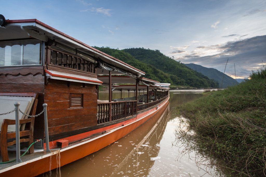 Pak Ou boat parking at the Luang Say Lodge, a luxury accommodation on the banks of the Mekong River, Pakbeng, Laos